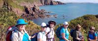 Picture of Hiking Wales women smile for group photo while hiking whales