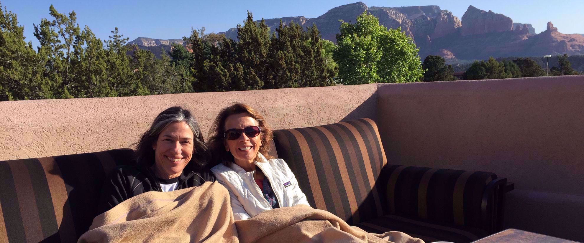 women smiling in the sunshine sedona group travel