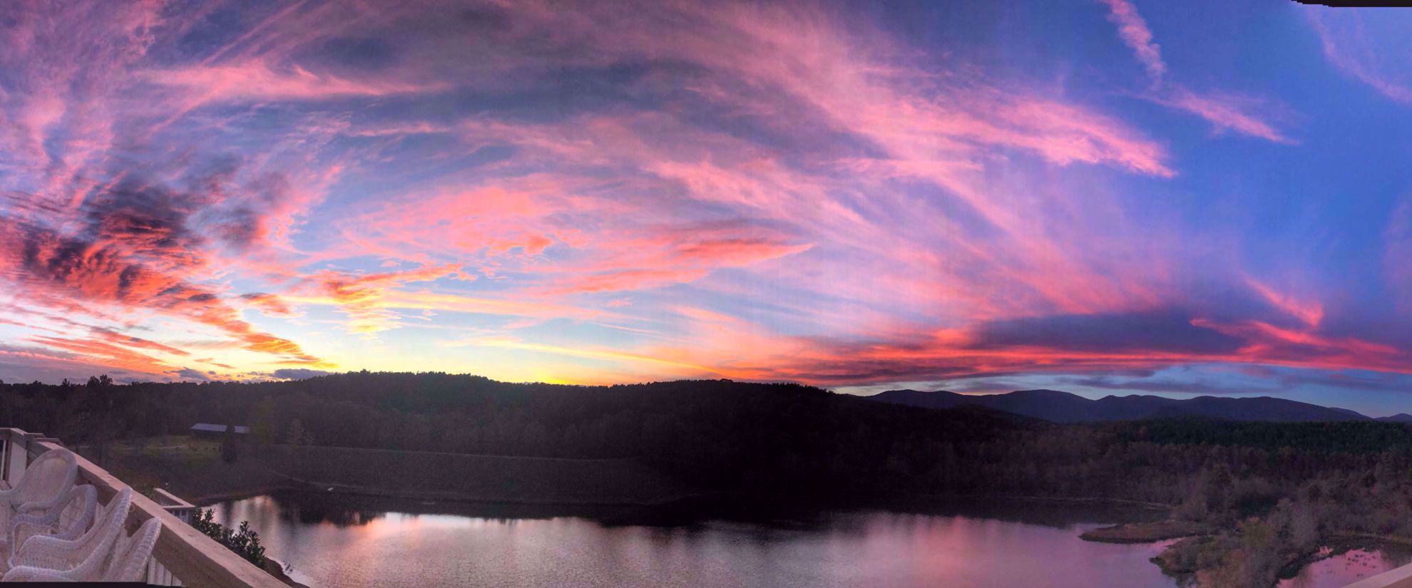 beautiful violet sunset over lake in georgia