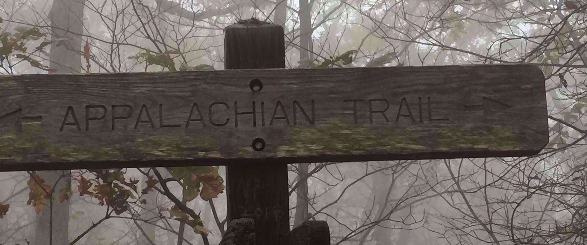 wood appalachian trail sign on hike in georgia