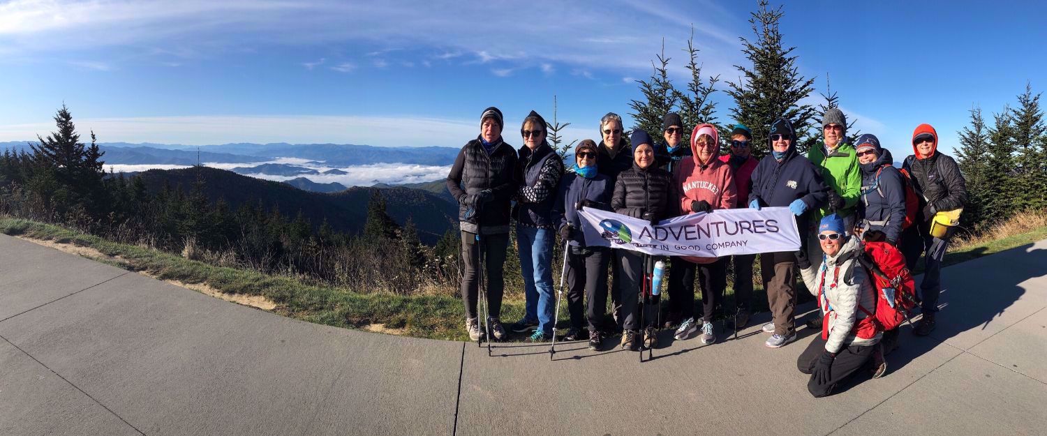 women overlook great smoky mountains with Adventures in Good Company Banner