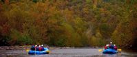 Picture of Fall in the Great Smokies Women rafting down river in great smokies with lovely fall foliage surrounding on river banks