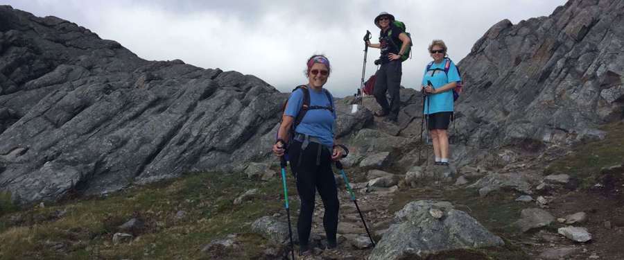 women hiking down mountains in VA